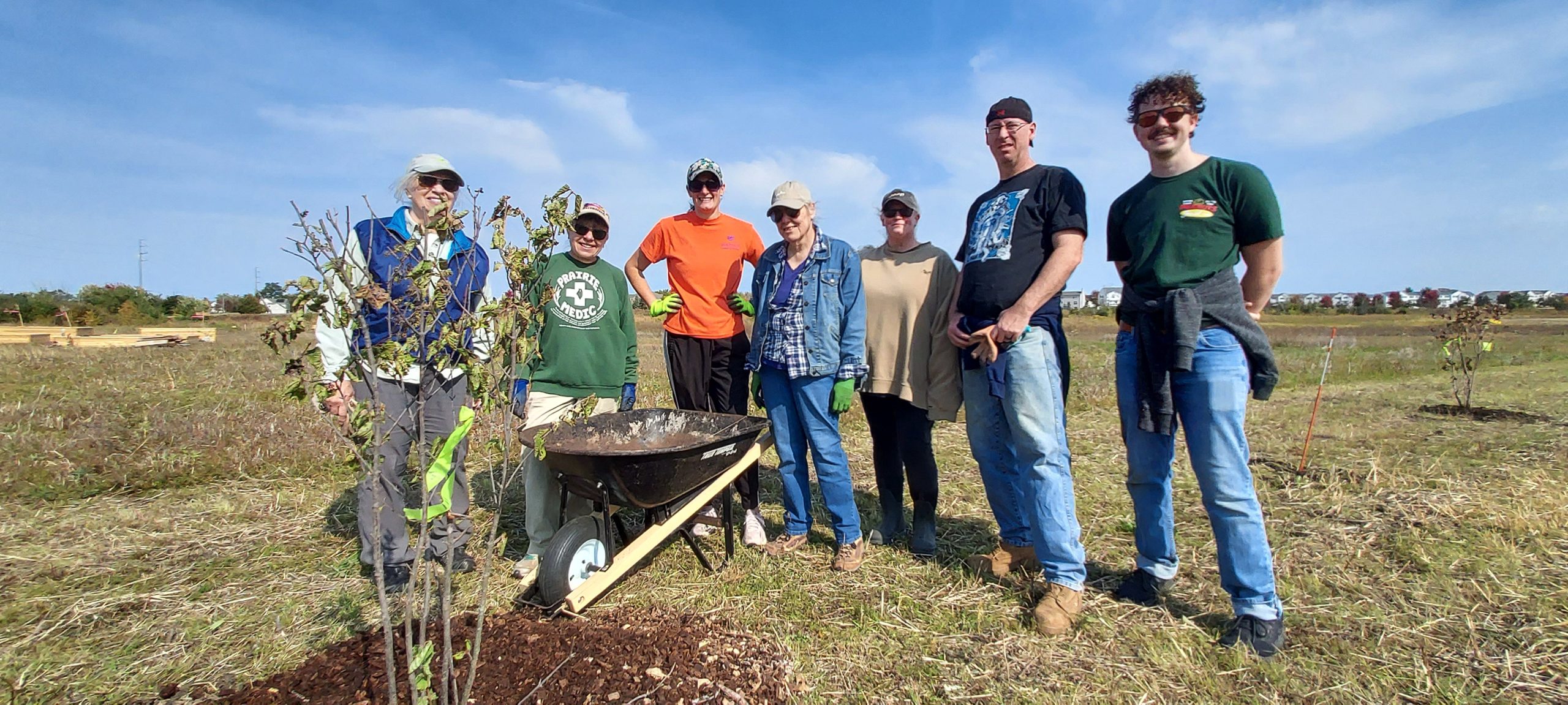 A group of volunteers at a community garden
