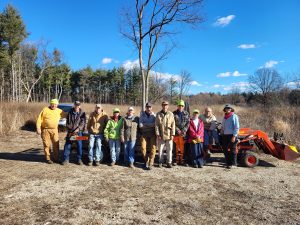 Group of people after a forest workday