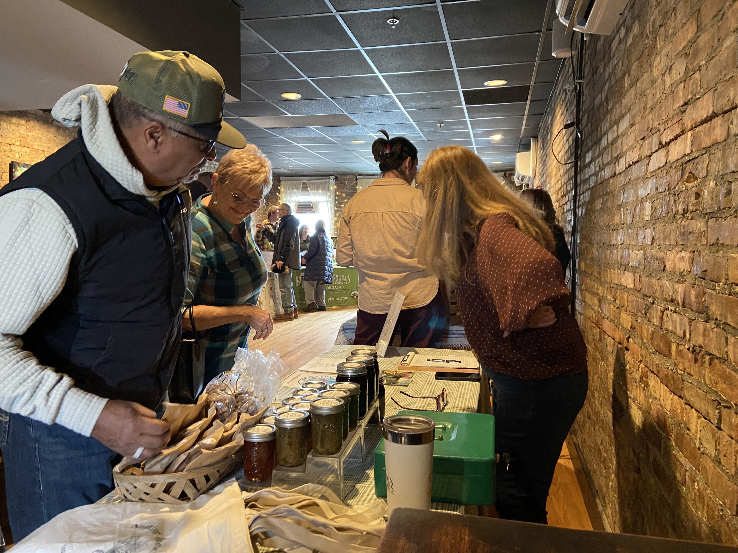 People visiting booths at TLC's CSA Fair in 2026