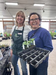 Two women at TLC's native plant sale