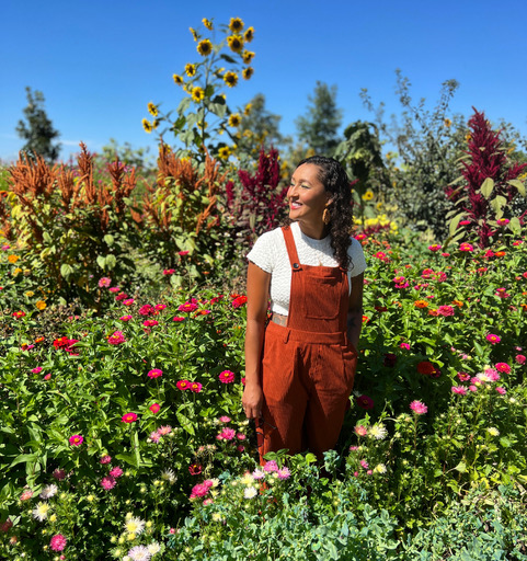A woman in a field of flowers