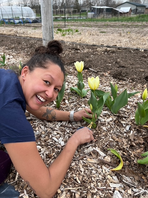 A woman planting flowers