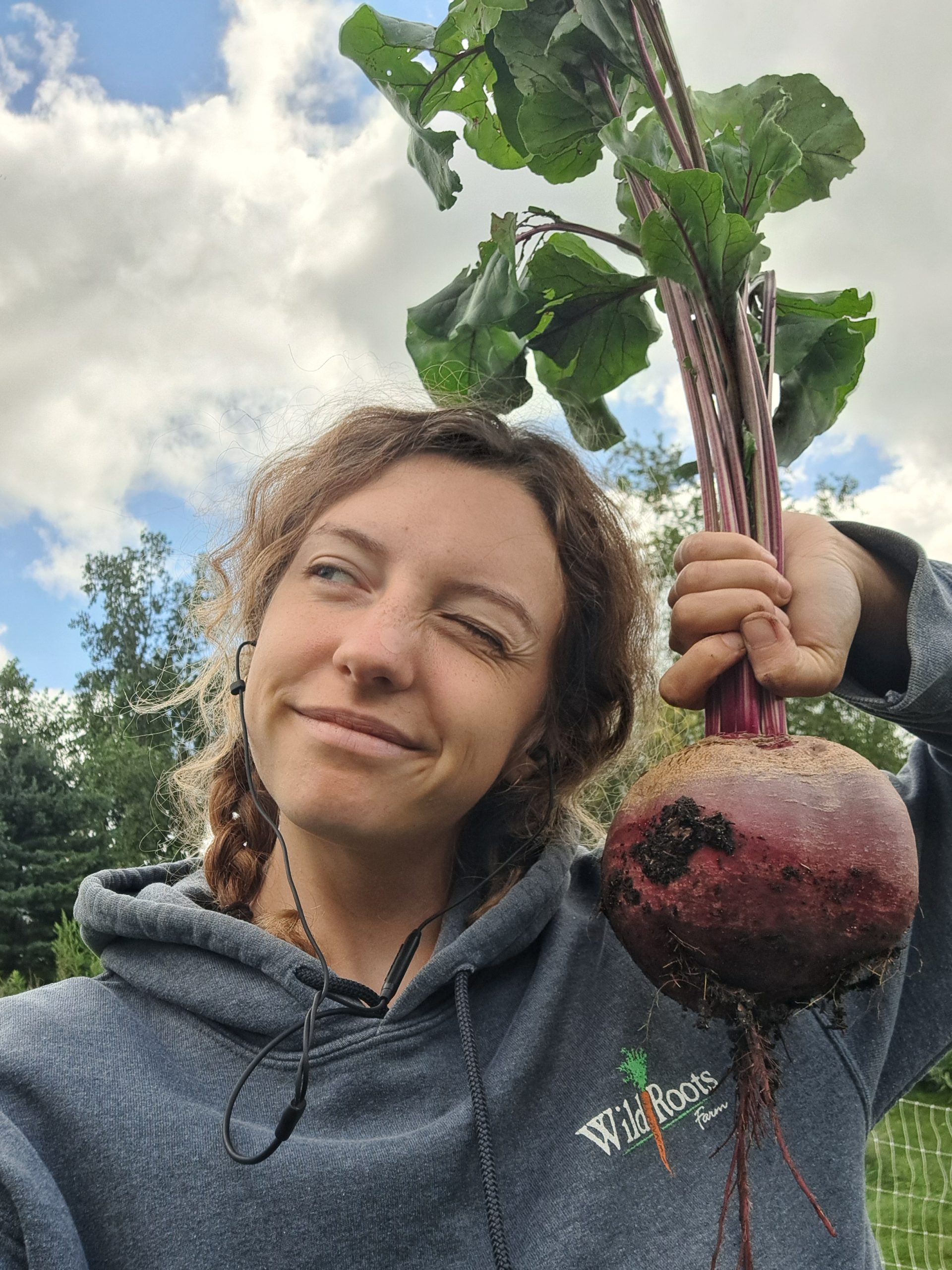 Anna Evans holding vegetables