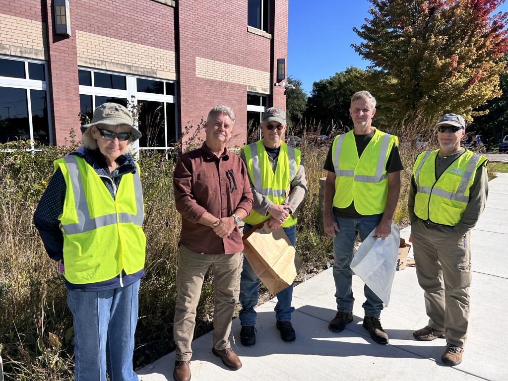 Five volunteers posing for a photo