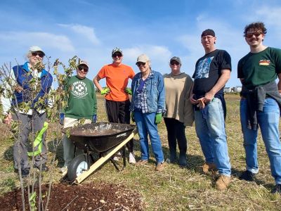 A group of volunteers at a community garden